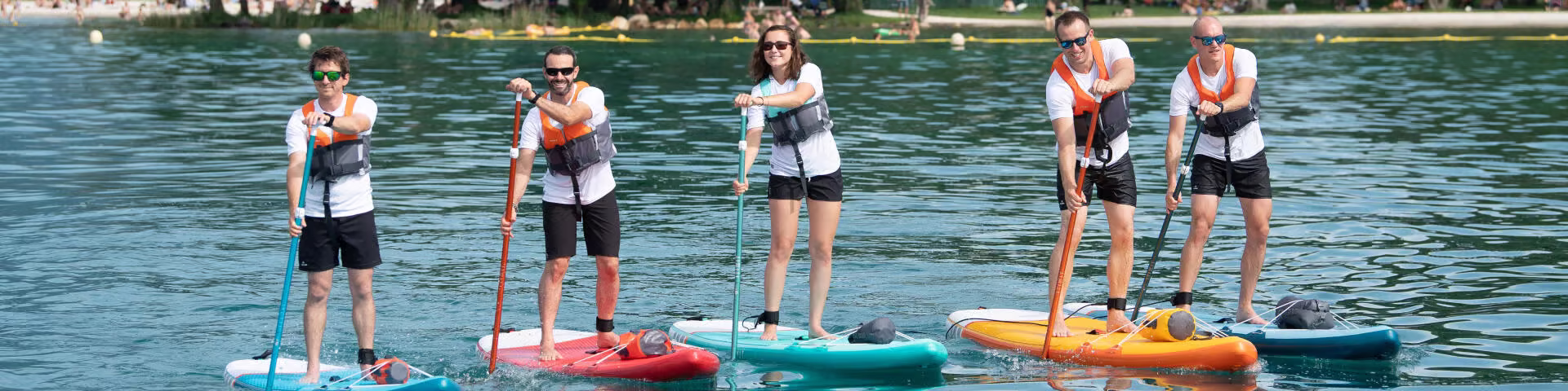 Gumotex Geschaft -Gumotex Geschaft group people practicing stand up paddle